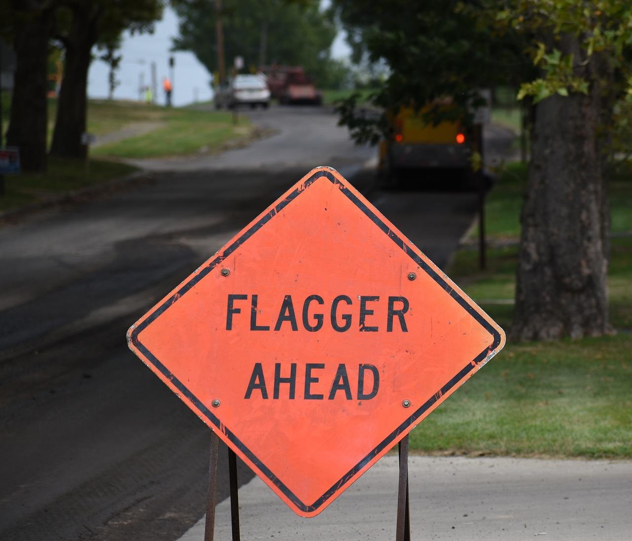 flagger, construction, road-2653402.jpg